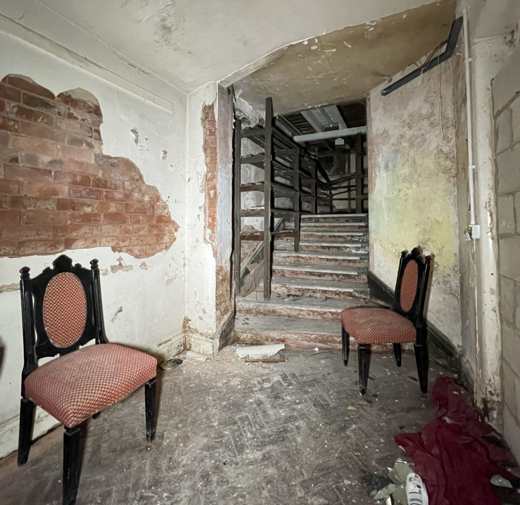 An urban explorer found a derelict museum filled with blood red warnings and a pentagram on the floor describing the eerie abandoned site as something straight out of a horror film.