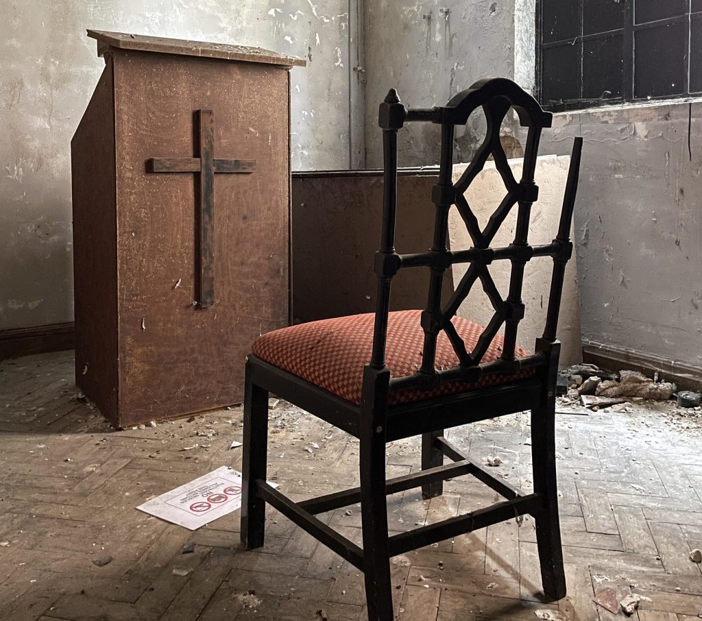 An urban explorer found a derelict museum filled with blood red warnings and a pentagram on the floor describing the eerie abandoned site as something straight out of a horror film.