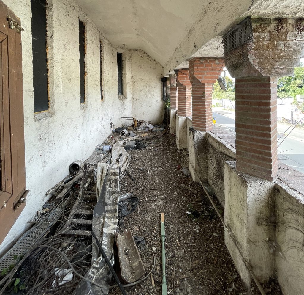 An urban explorer found a derelict museum filled with blood red warnings and a pentagram on the floor describing the eerie abandoned site as something straight out of a horror film.