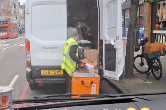 A courier was filmed carelessly throwing parcels into a van on Camden High Street - including one marked HP laptop - leaving shocked onlookers stunned by his reckless handling.