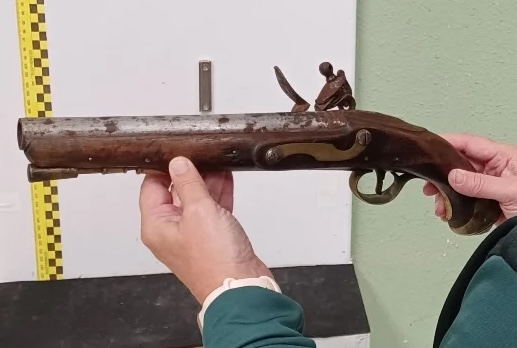 Spanish police are investigating a woman accused of mailing a historic flintlock pistol linked to King George III - the 19th-century firearm was found in perfect working order.
