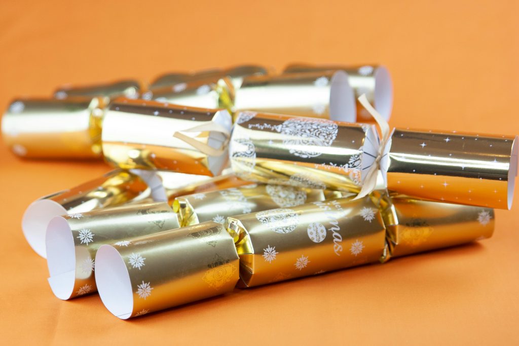 Shoplifter caught stealing three Christmas crackers is arrested after police discover he is already wanted leaving the festive thief in custody thanks to sharp eyed staff.