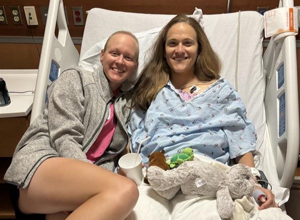 Triplet sisters Kate and Elizabeth Singletary both face breast cancer at 27 battling side by side after discovering a shared genetic mutation and strengthening their bond through treatment.