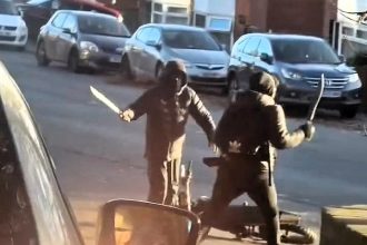A machete-wielding gang was caught on camera brawling in broad daylight on Kirkstall Hill in Leeds, terrifying locals before police arrested an 18-year-old man over the violent rampage.