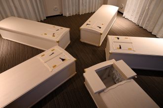 A Tokyo spa offers meditation inside real coffins where guests reflect on life and death in a peaceful setting with music and visuals for just £10 a session.