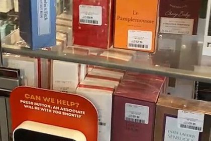 TK Maxx has locked its perfumes in cabinets ahead of Christmas to stop thefts - shoppers must now press a buzzer for staff assistance to buy scents from £19.99.