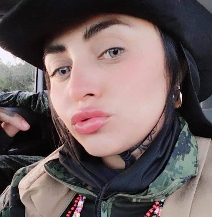 A feared Gulf Cartel hitwoman known as La Chucky was killed in a shootout with police in Mexico - five people died as officers seized guns, vests and ammunition.