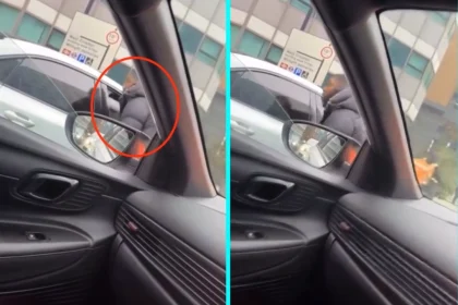 A furious driver was caught on camera threatening a motorist at traffic lights in Croydon, repeatedly demanding he open his door while threatening consequences in an aggressive road rage confrontation.