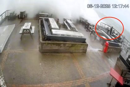 Storm Bram sends a massive wave crashing over a coastal pub drenching beer garden drinkers and sweeping furniture as The Inn on The Beach warns visitors to enjoy the weather at their own risk.