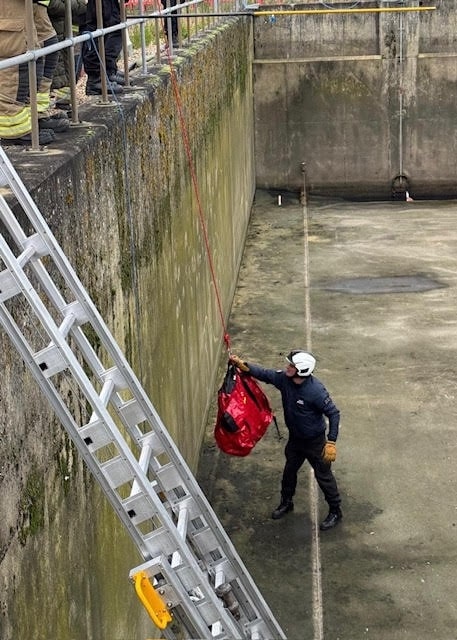 A fox trapped in a 25ft deep storm tank was rescued by firefighters and animal experts using a long grabber, suffering only worn claws from attempting to escape overnight before being released.