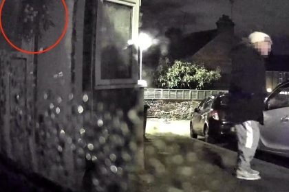 Family left stunned as Grinch like thief steals Christmas wreath during festive film night ripping it from front door on CCTV sparking shock anger and disbelief at heartless act.