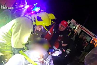 Footballer Vasyl Kravets survives terrifying crash after lorry smashes into family car leaving wife and child trapped as wrecked Mercedes sparks miracle escape claims.