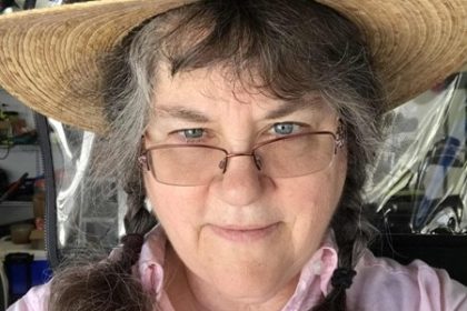 Woman claims cancer vanished after near-death experience during emergency surgery where she floated through darkness, entered a spiritual car wash and argued with angels before returning.