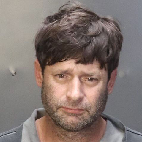 Man allegedly trying to burn neighbours home sets himself on fire after pouring petrol and igniting it police arrest suspect after racist abuse claims and failed arson plot.