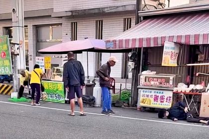 Man collapses after being bitten by his own pet python while wearing it like a scarf as shocked bystanders step in to restrain the snake in Taiwan.