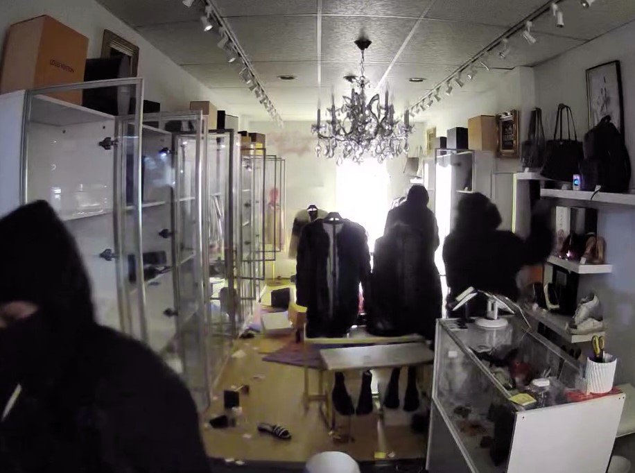 Six masked raiders cleared out a luxury boutique in under a minute, stealing nearly all inventory worth up to £2,960 per item during an early morning burglary in Chicago.