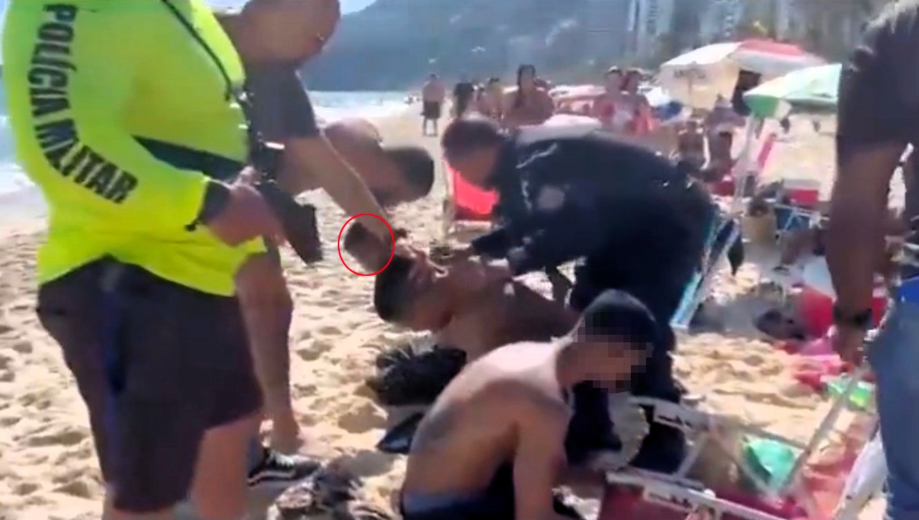 Armed police arrested suspected drug traffickers on a Rio beach in front of sunbathers, capturing a fugitive gang leader who had been hiding in favelas for nearly a year after a deadly operation.