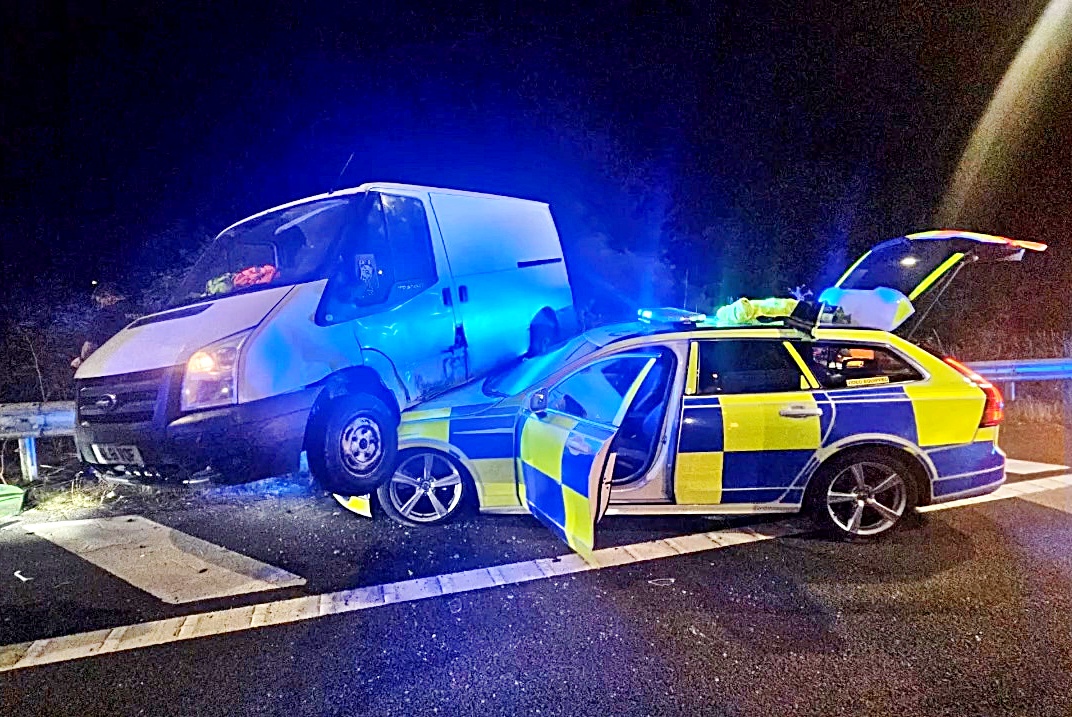 Police ram van to stop wrong way motorway entry as reckless driver speeds through red lights and roundabouts then is jailed before Christmas after dramatic M4 chase in Berkshire.