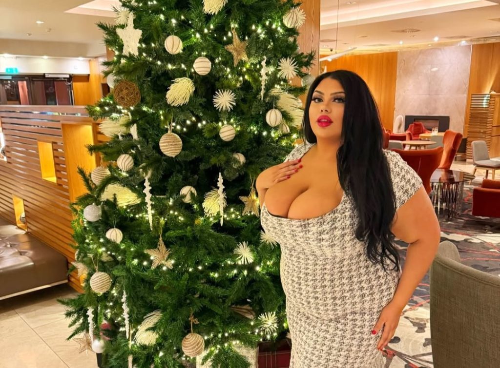 Plus size influencer sparks viral debate after sitting on Santas lap in Europe as shocked bystanders stare prompting conversations about body confidence beauty standards and acceptance abroad.