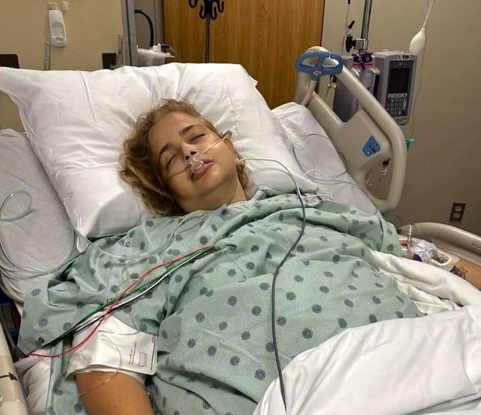 Mum survives alleged botched surgery that left her stomach behind her heart and now lives with no stomach urging others to choose self love over pressure and research cosmetic procedures.