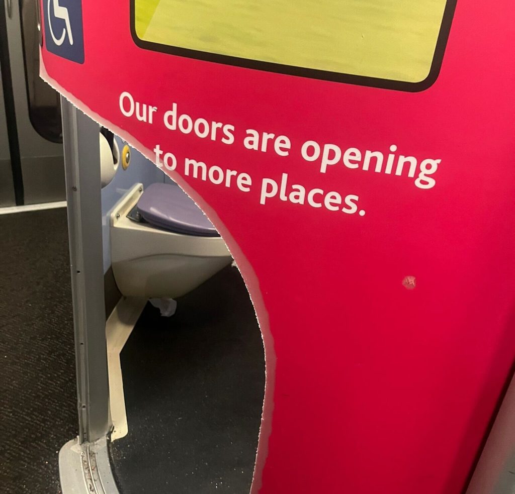 Severely claustrophobic Robin Smith trapped in train toilet for nearly 2 hours. Firefighters cut through door to rescue her after she almost fainted twice.