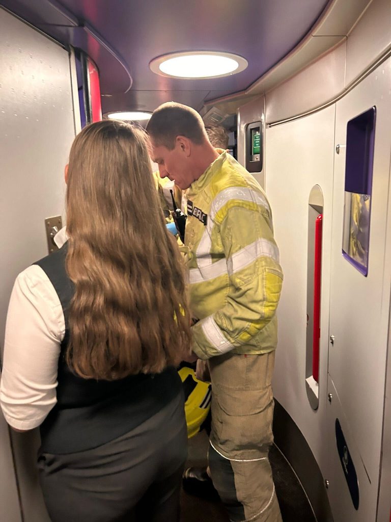 Severely claustrophobic Robin Smith trapped in train toilet for nearly 2 hours. Firefighters cut through door to rescue her after she almost fainted twice.