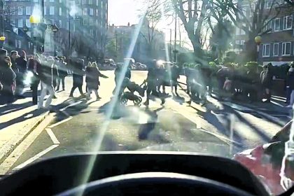 Frustrated motorists filmed eight groups of Beatles fans recreating the famous Abbey Road zebra crossing photo in just 66 seconds, repeatedly holding up traffic outside the studios on Saturday.