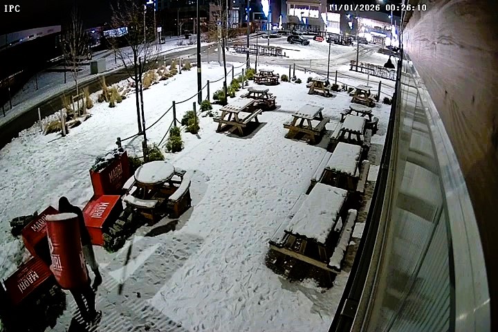 Two thieves caught on CCTV stealing Madri bar table from Herbert's Yard Birmingham - brazenly wore it like a hat while strolling off, venue appeals for table's return.