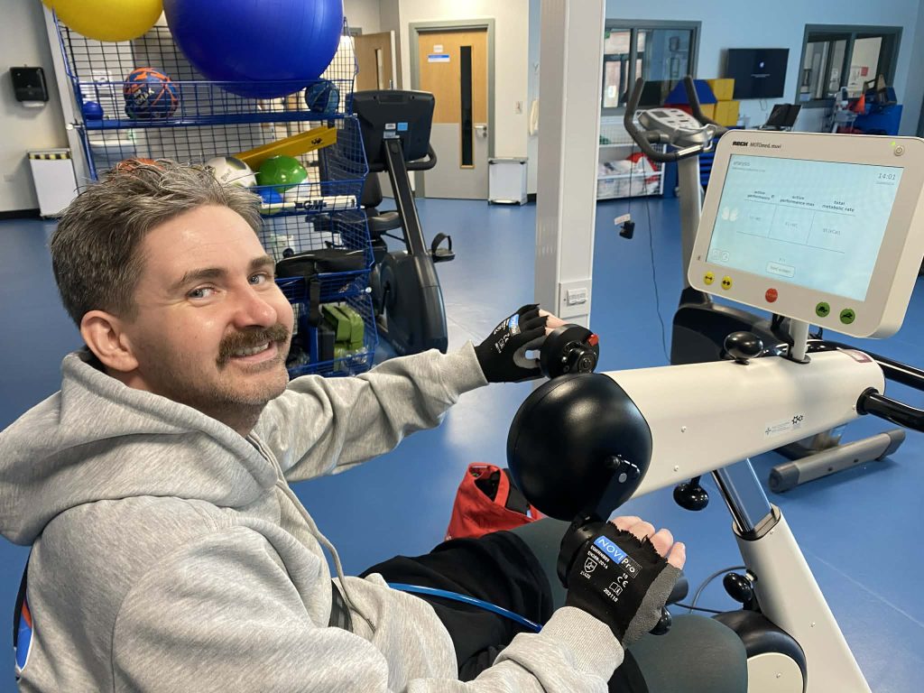 British man Dan Richards walks again using AI robot suit after breaking his neck in New Year's Eve wave dive left him paralysed and told he'd be bed-bound for life.