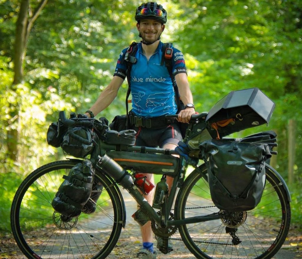 Cyclist Florian Berg, 29, killed by lightning during around-the-world trip to combat climate change. German activist died in storm in Peru's Andes mountains.