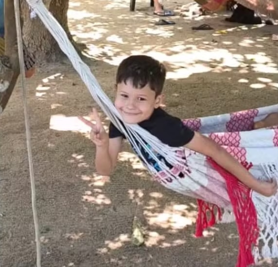 Brazilian father Jeremias Machado Ribeiro and son Bernardo drowned after he saved his eldest child from a river on Christmas Day but lost strength in the current.