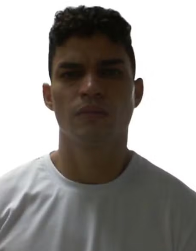 Brazilian social media influencer Bárbara Keully Matos dos Santos arrested after posting video dancing with handguns allegedly belonging to local drug lord while friend remains on the run.