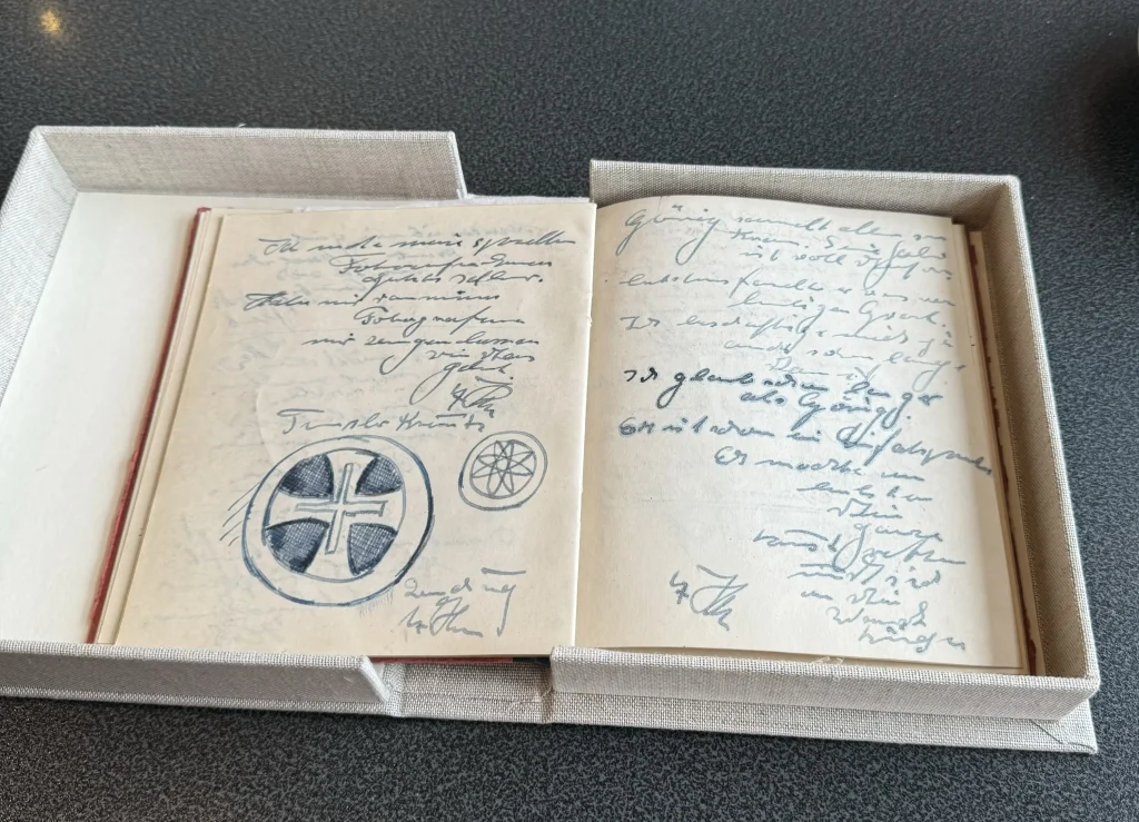Diary believed to be Adolf Hitler's discovered in attic and sold for £26,000. The 113-page notebook contains references to Hermann Goring and Hitler's alleged love for Marlene Dietrich.