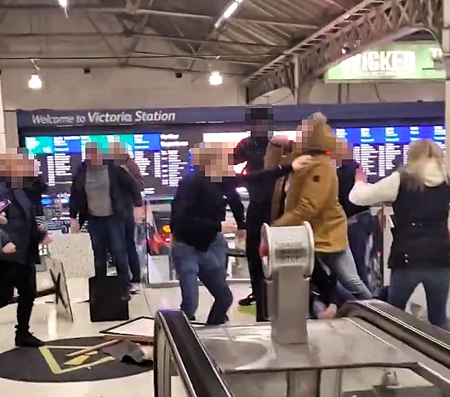 Mass brawl erupted at Wetherspoons in Victoria Station, London, with eight people fighting on tables as shocked passengers watched, leading to nine arrests on Saturday night.