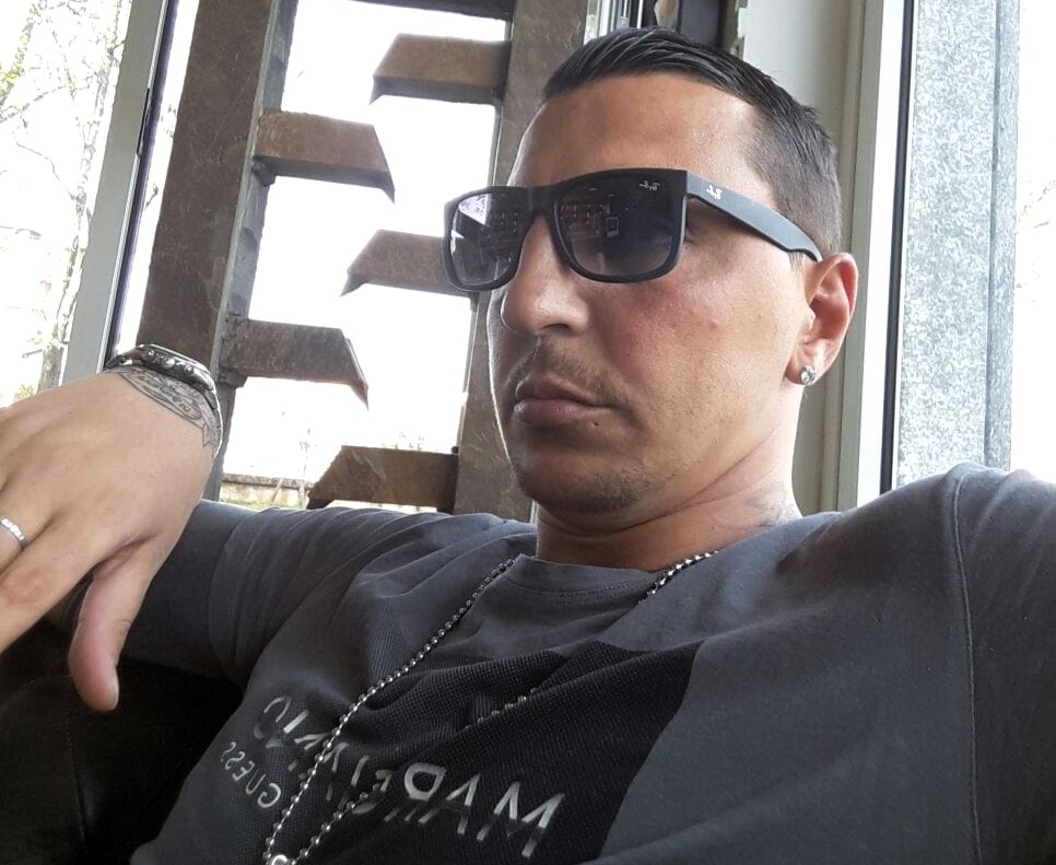 Reveller Bruno Savoia, 43, dies in intensive care after blowing his own hand off with homemade firecracker on New Year's Eve in Vercelli, Italy. Horrific blast damaged building.