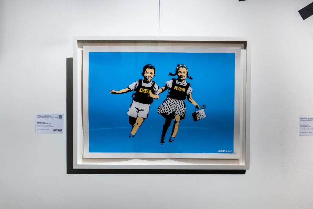 Collection of 13 Banksy prints including iconic Girl with Balloon set to raise £300,000 at Heritage Auctions. Features Basquiat tribute and Pulp Fiction banana piece.