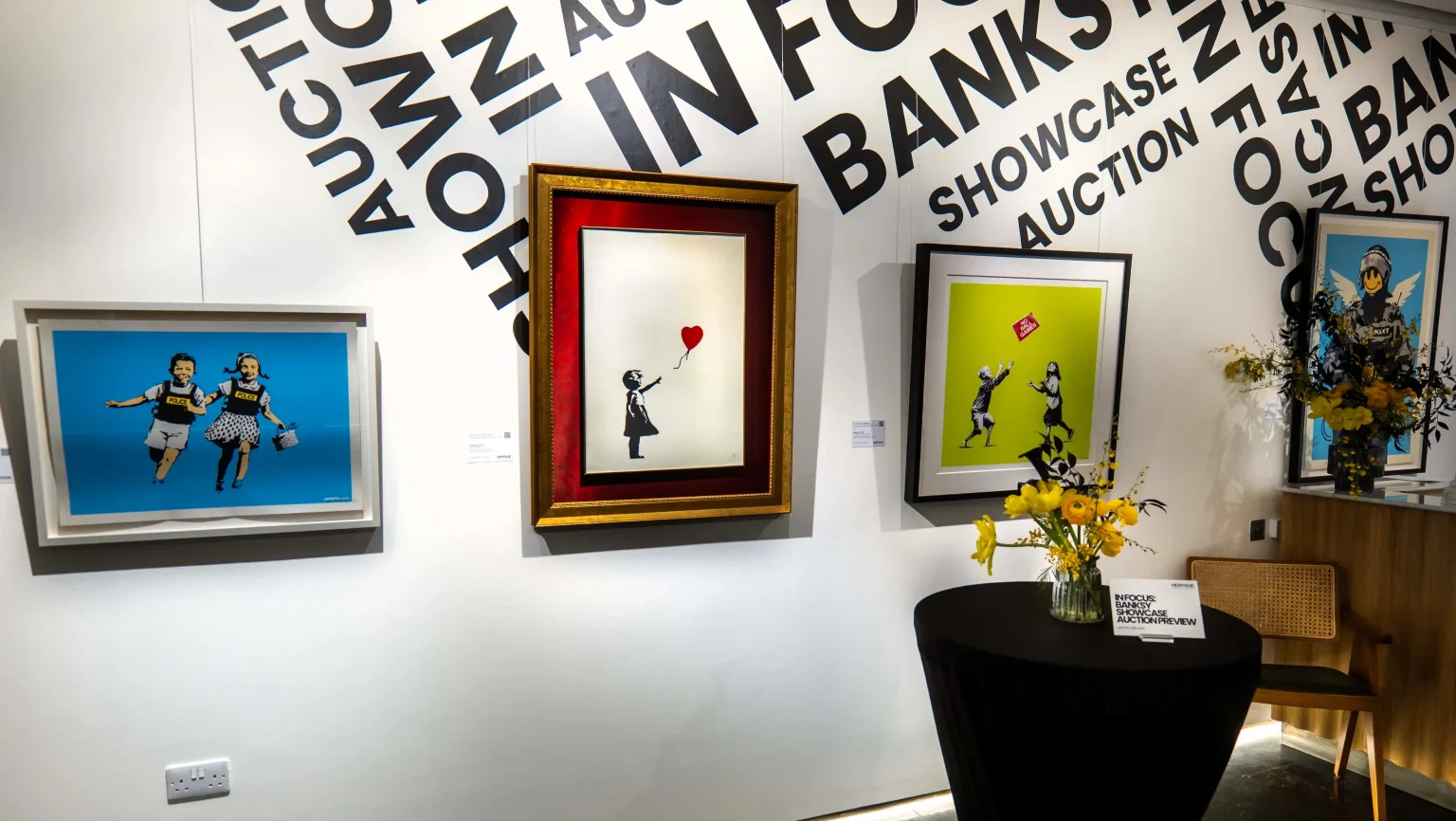Collection of 13 Banksy prints including iconic Girl with Balloon set to raise £300,000 at Heritage Auctions. Features Basquiat tribute and Pulp Fiction banana piece.