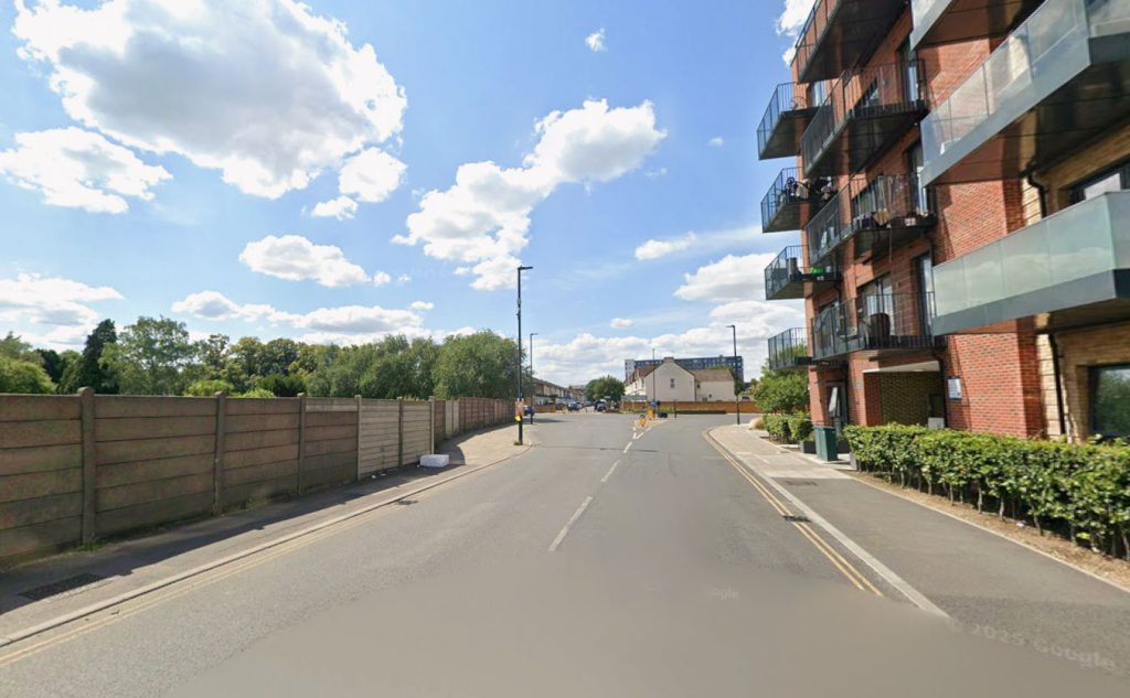 Armed hooded man chases car through Southall traffic forcing driver to reverse wrong way down busy road. Man in 30s stabbed in hand during clash. One arrested.
