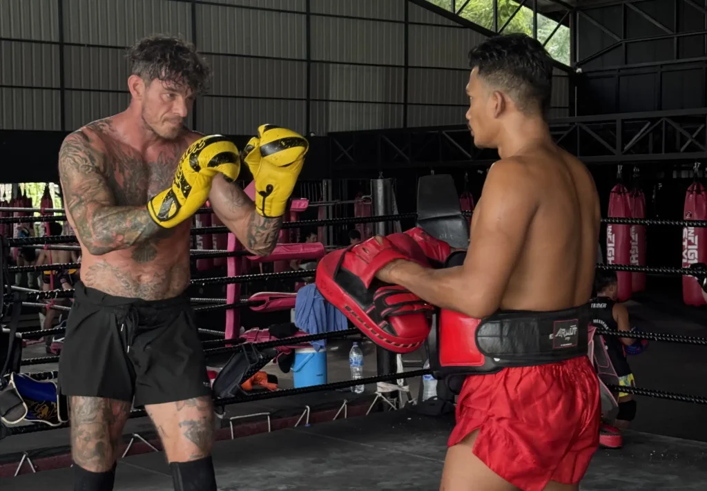 Sales director, 44, quits corporate job after hitting rock bottom with addiction and burnout. He moves to Thailand to pursue Muay Thai dreams and runs wellness retreats.