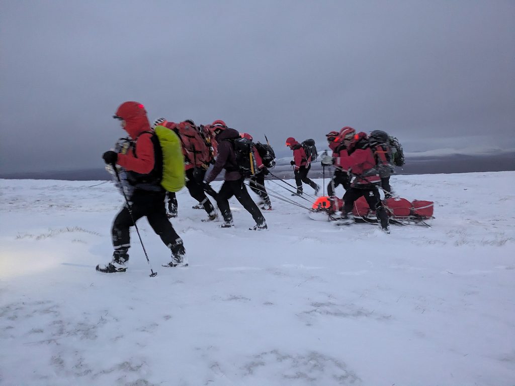 A climber attempting to walk Scotland's entire 750-mile watershed in winter shattered his ankle on the final mountain - and waited six hours in the dark before volunteer rescuers carried him to safety.