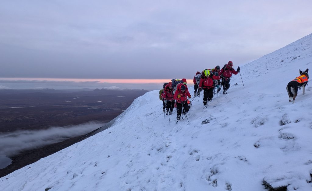 A climber attempting to walk Scotland's entire 750-mile watershed in winter shattered his ankle on the final mountain - and waited six hours in the dark before volunteer rescuers carried him to safety.