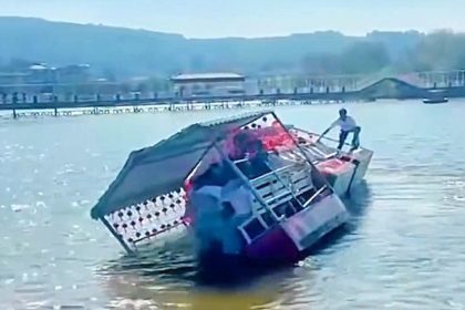 Four people drowned and 22 were flung into the water after a tourist boat capsized during Lunar New Year celebrations at a Chinese wetland resort - with none wearing life jackets.