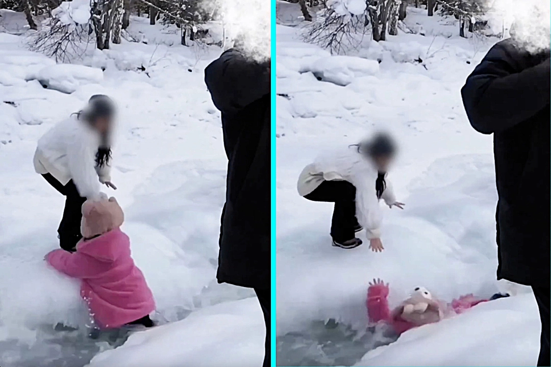 Girl falls into freezing -20C river at China's Kanas Scenic Spot and mum dives in to save her. Tour guide rescues both from icy water after they ignored warning signs.