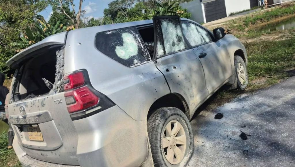 Gunmen fire 400 rounds at Colombian senator's bulletproof SUV killing two bodyguards Wilmar Leal and Esmeli Manrique. Both fathers had pregnant wives at home.
