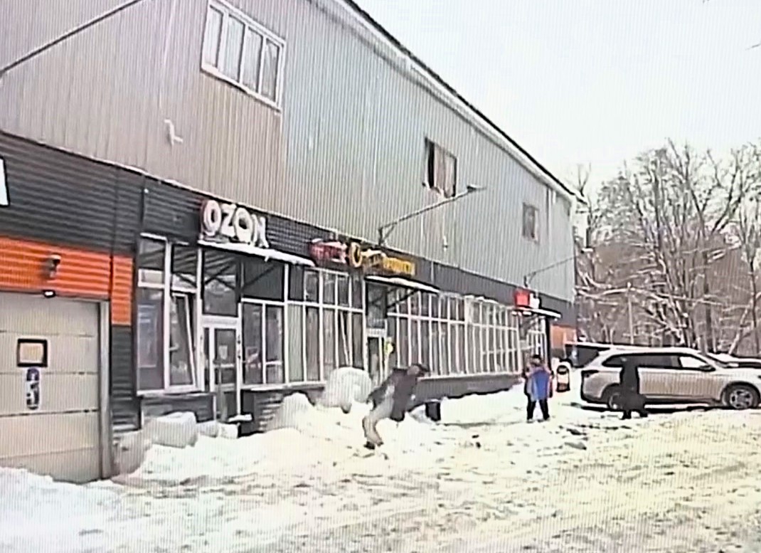 Woman hit by huge ice slab falling from supermarket roof in Russia suffers severe head injury. Ice bounced off window sill before striking her face.