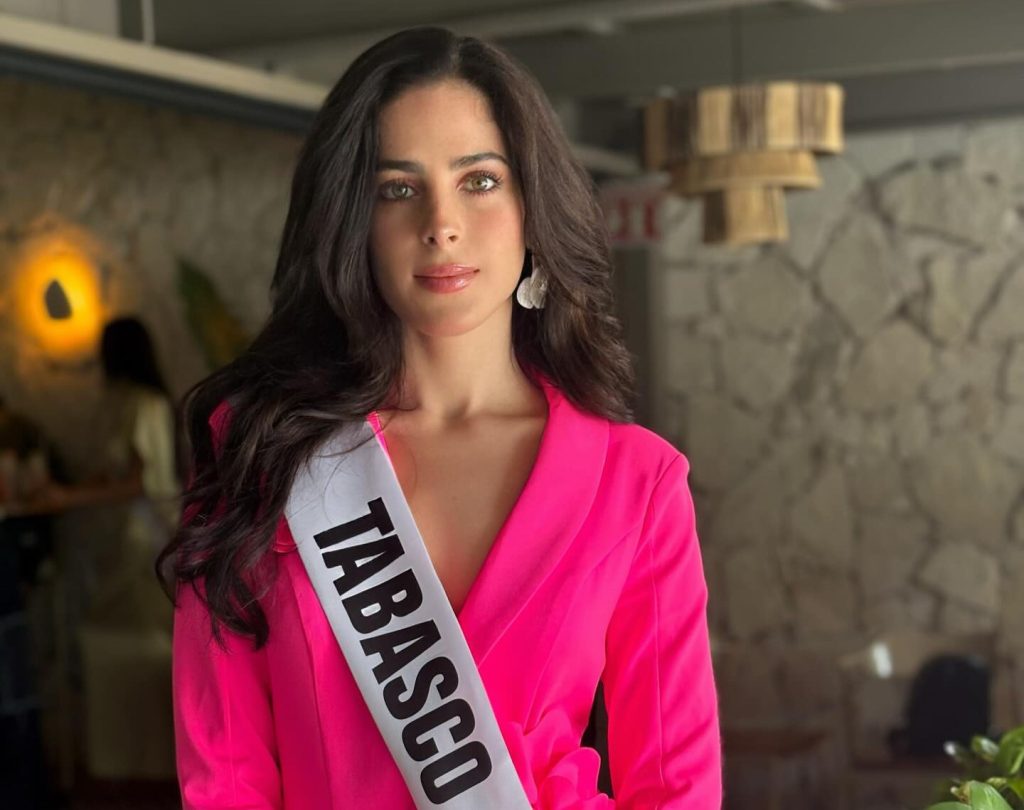 Miss Universe Fatima Bosch, 25, collapses on carnival float in Ecuador in front of thousands. Mexican model may have suffered altitude sickness at 8,465ft above sea level.