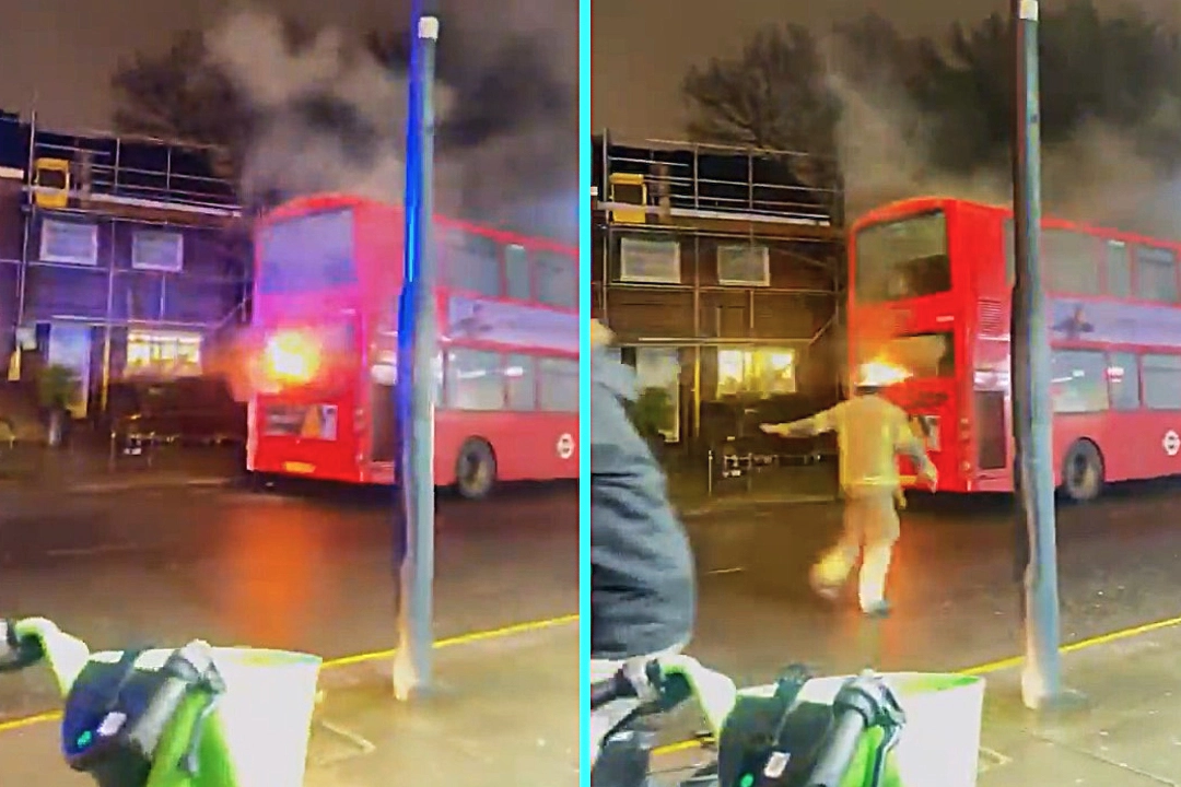 Double decker bus bursts into flames on Kilburn Lane forcing passenger evacuation. Two fire engines battle blaze engulfing upper deck. No injuries reported.