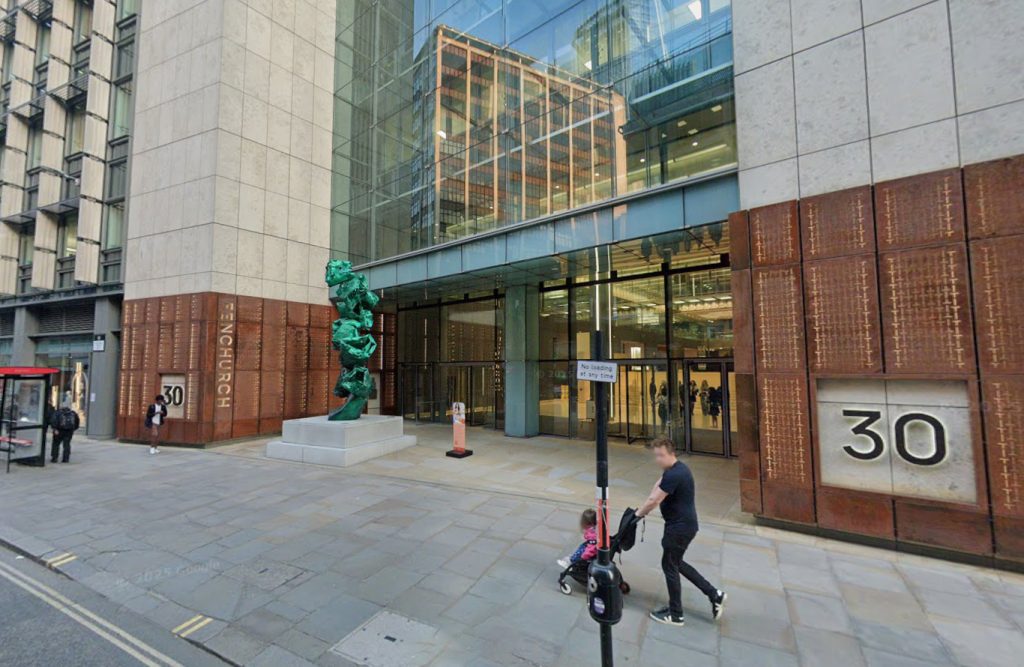 People Against Genocide activists stage sit-in protest at Aspen Insurance building on Fenchurch Street, London. Three protesters chant against alleged Elbit links.