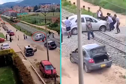 Quick-thinking bystanders raced to shove a stranded family car off a railway crossing in Colombia just seconds before a freight train came thundering down the line.