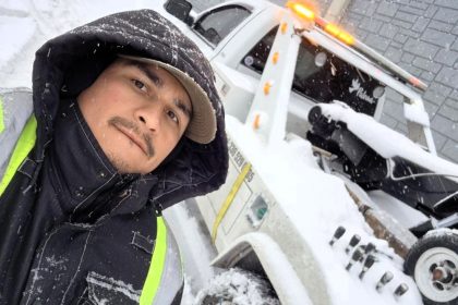 Tow truck driver plunges 10 feet down drain hidden by snow during call-out in North Carolina. Diego Burgos' bodycam captures shocking fall that left him dizzy.